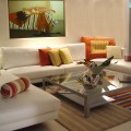 sofa-white-fabric-modern-pillow-orange-yellow-table-glass-painting-carpets-fullcolor-wall-cream-paper-pots-floor-cream-ceramic